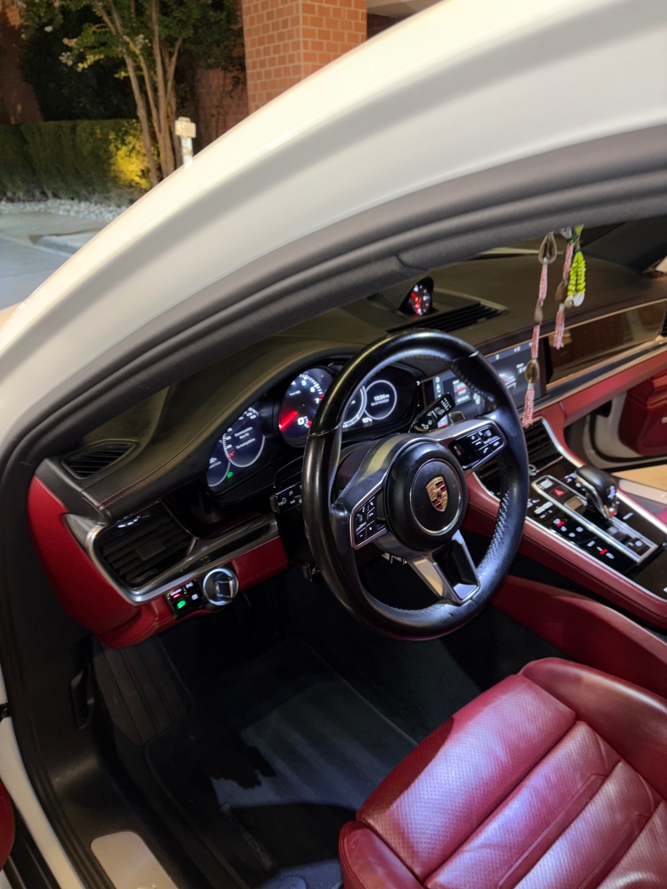 Red leather Porsche Panamera interior at night